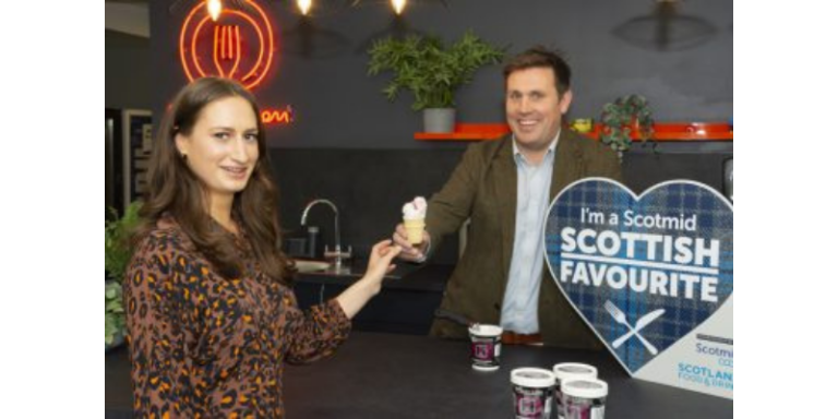 man and woman posing with ice cream