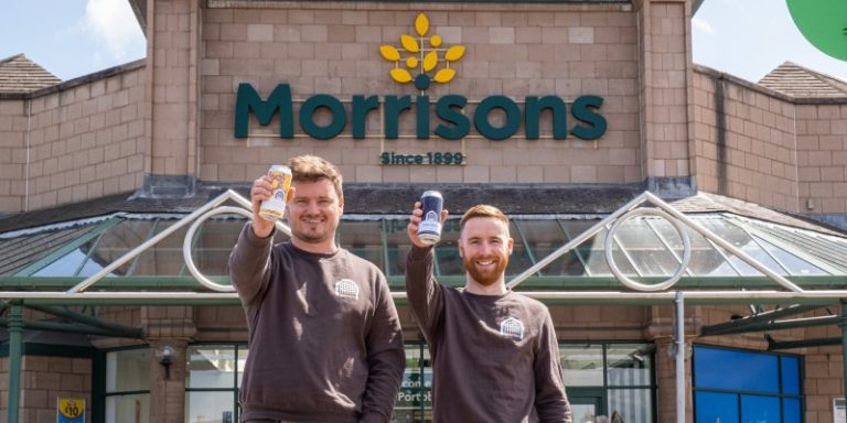 men posing with beer