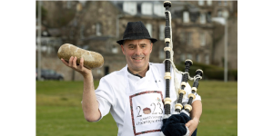 man with haggis and bagpipe